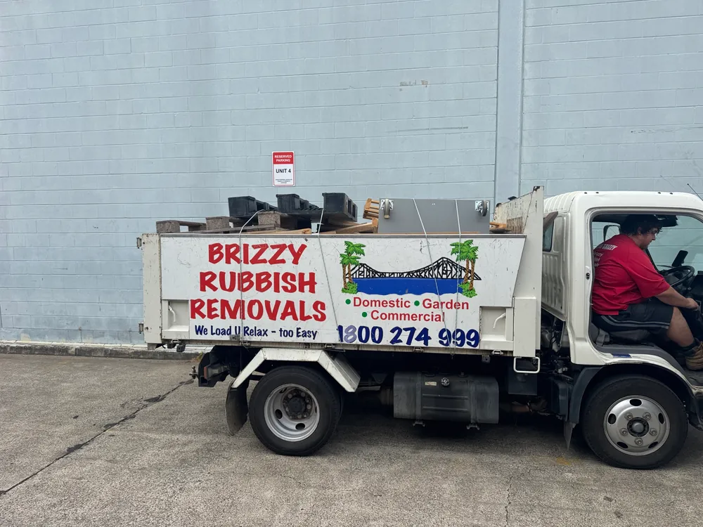 Truck loaded with pallets and plastic crates during a warehouse clearout for a Brisbane business