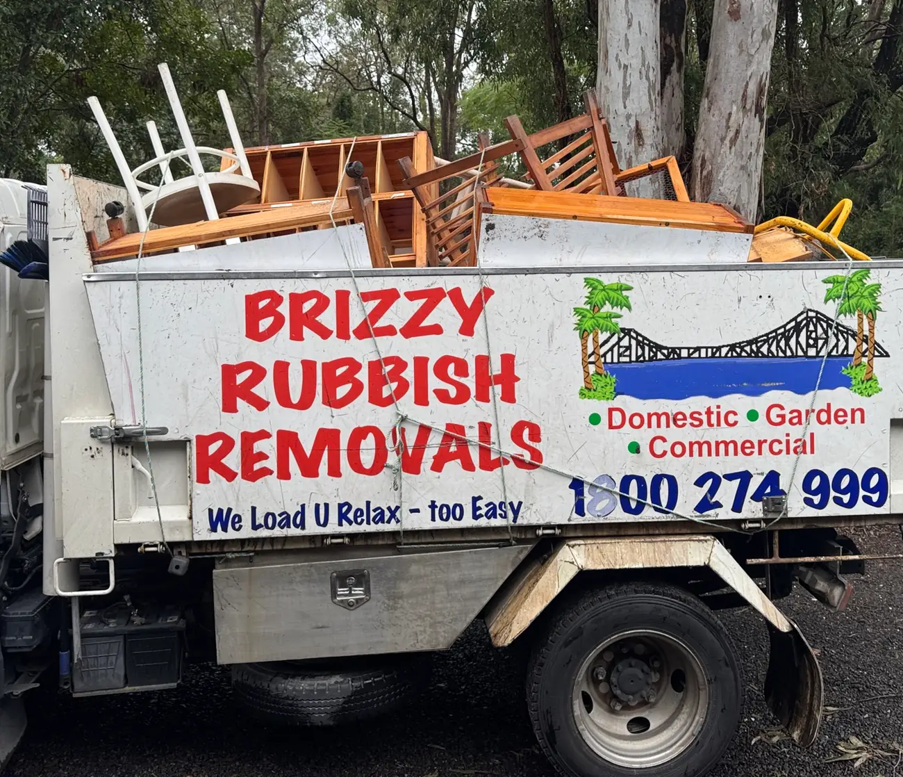 Truckload of garden waste and branches for green waste removal in Brisbane