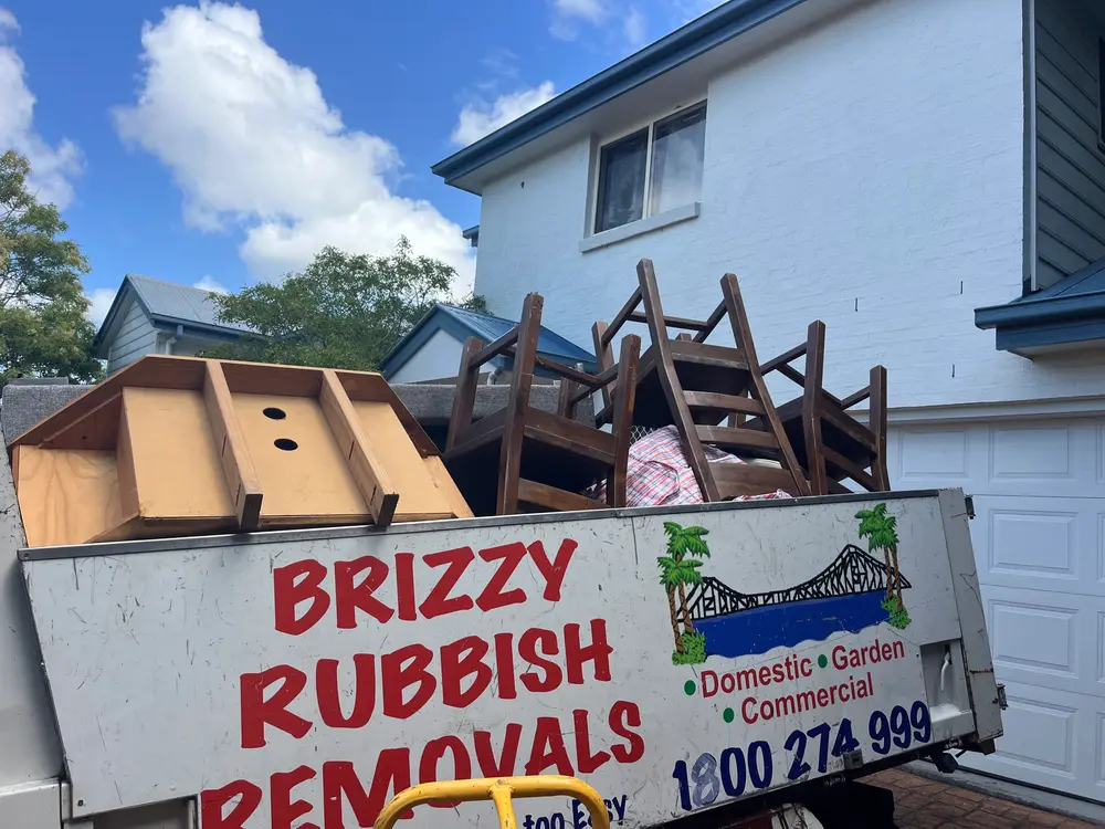 Old dining chairs and furniture removed from a Morningside home